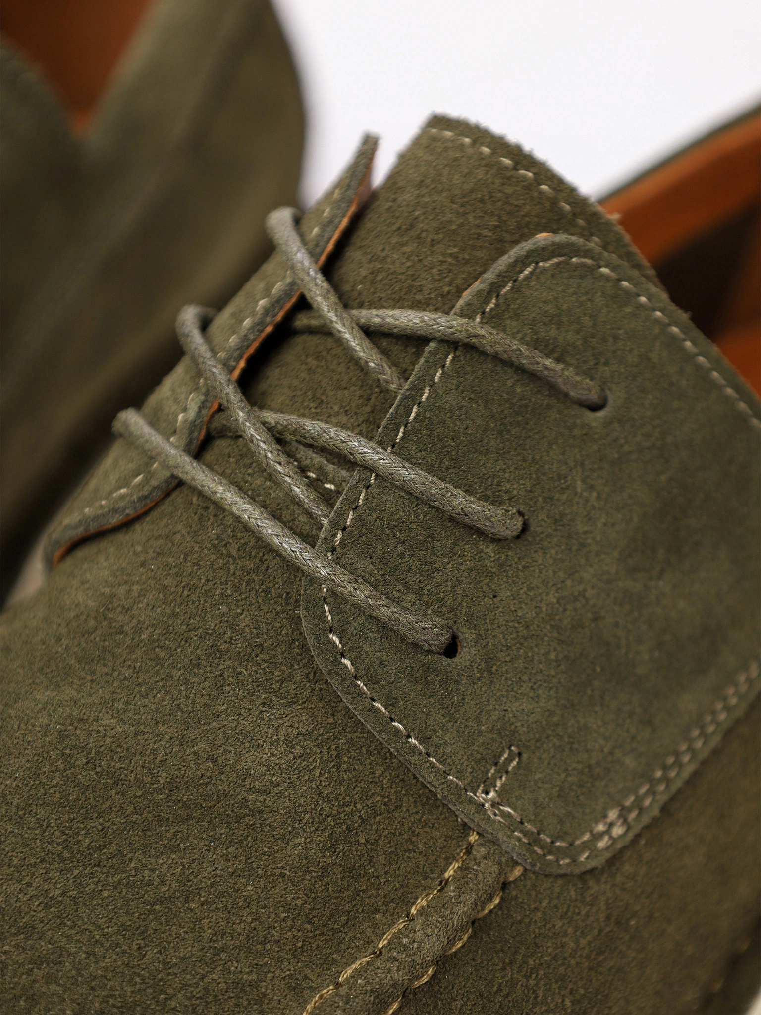 Мокасины зеленого цвета со шнуровкой